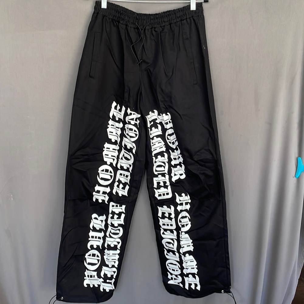 ☑️NWT BoohooMAN SUPER WIDE elastic waist pants with white writing on front. SZ30